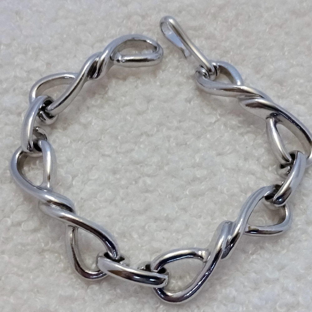 Vintage Avon Silvertone Infinity Knot Panel Bracelet 8 in - Picture 7 of 9